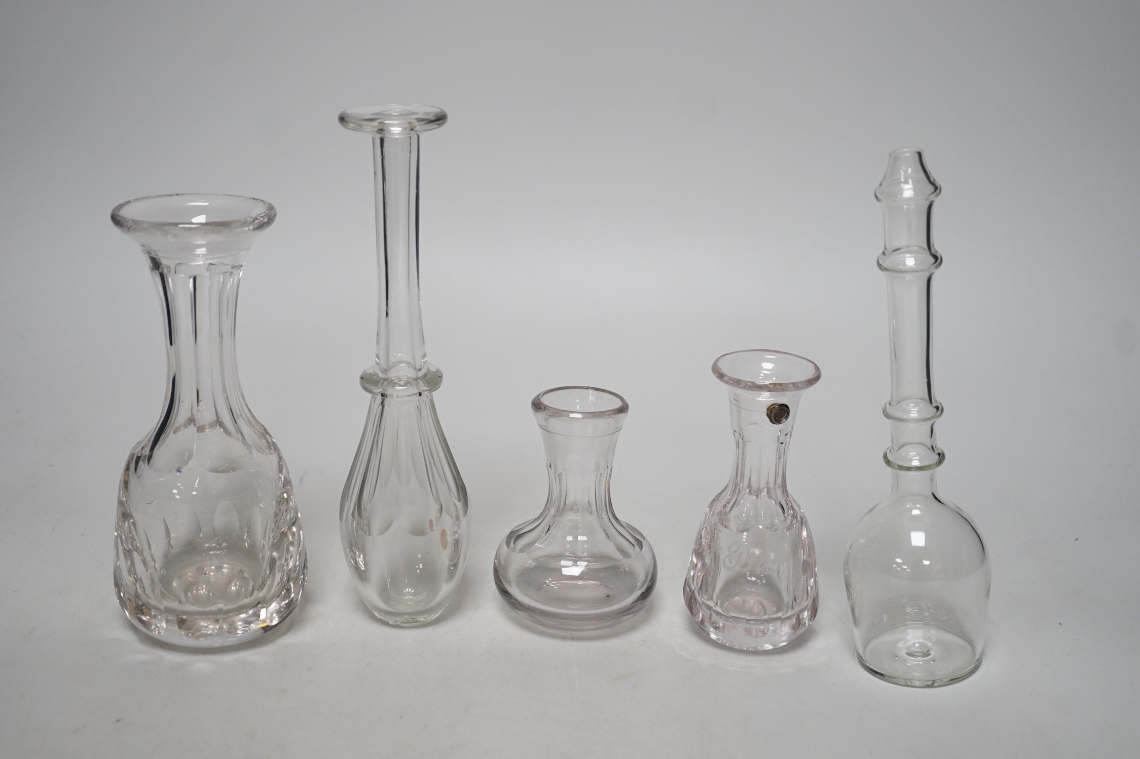 Three 19th century glass measures and two toddy lifts (5), tallest 19cms high